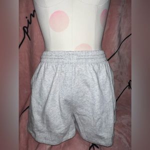 PINK dad shorts logo